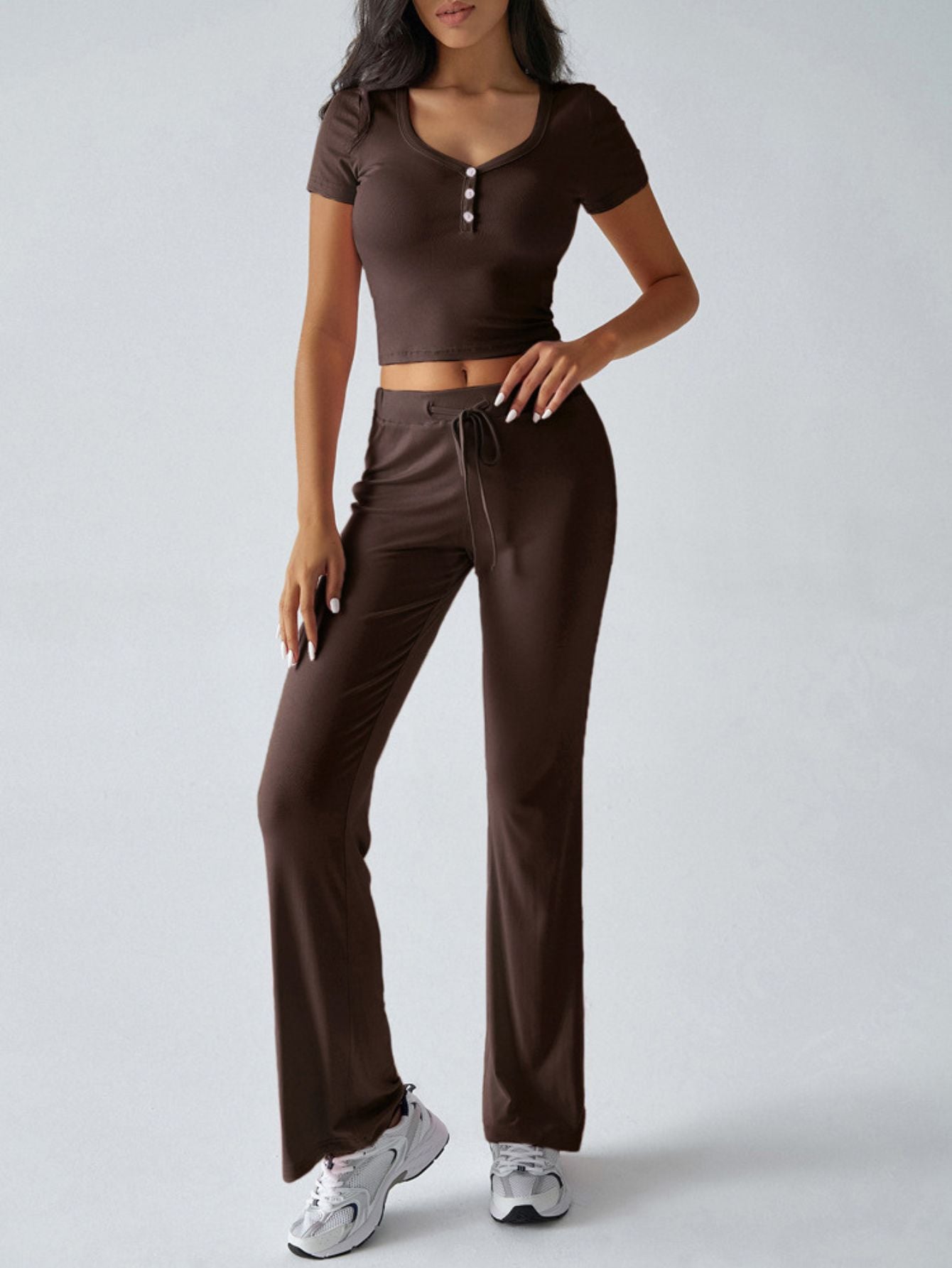 Model wearing Y2K lounge set with flare pants front view