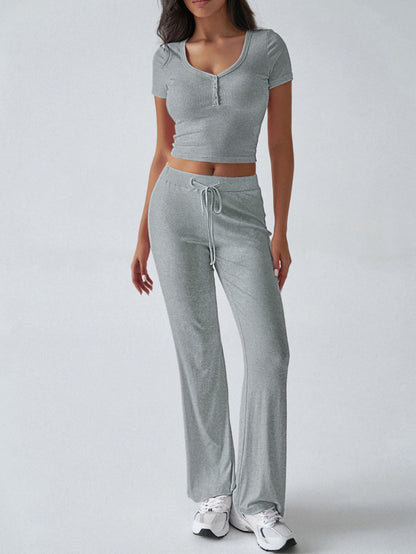Model wearing Y2K lounge set with flare pants front view